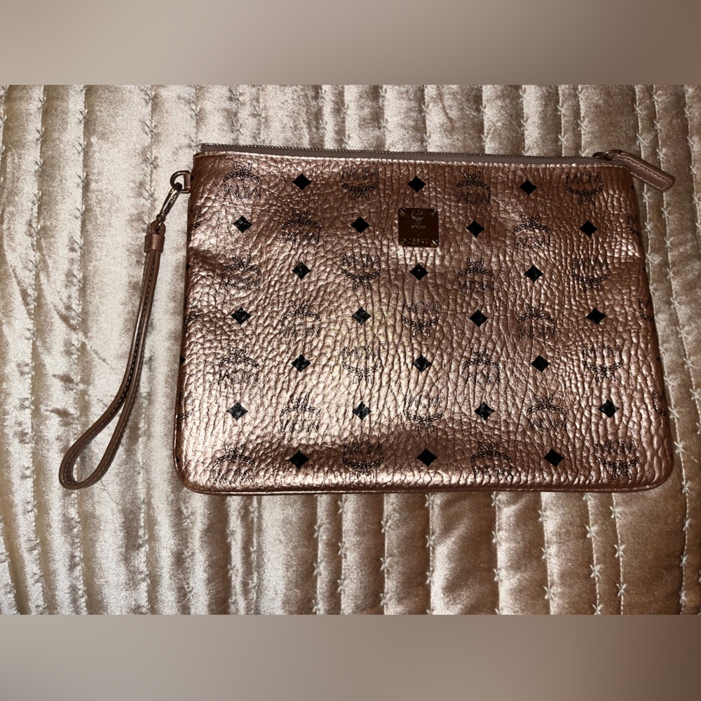 Rose gold MCM large wristlet